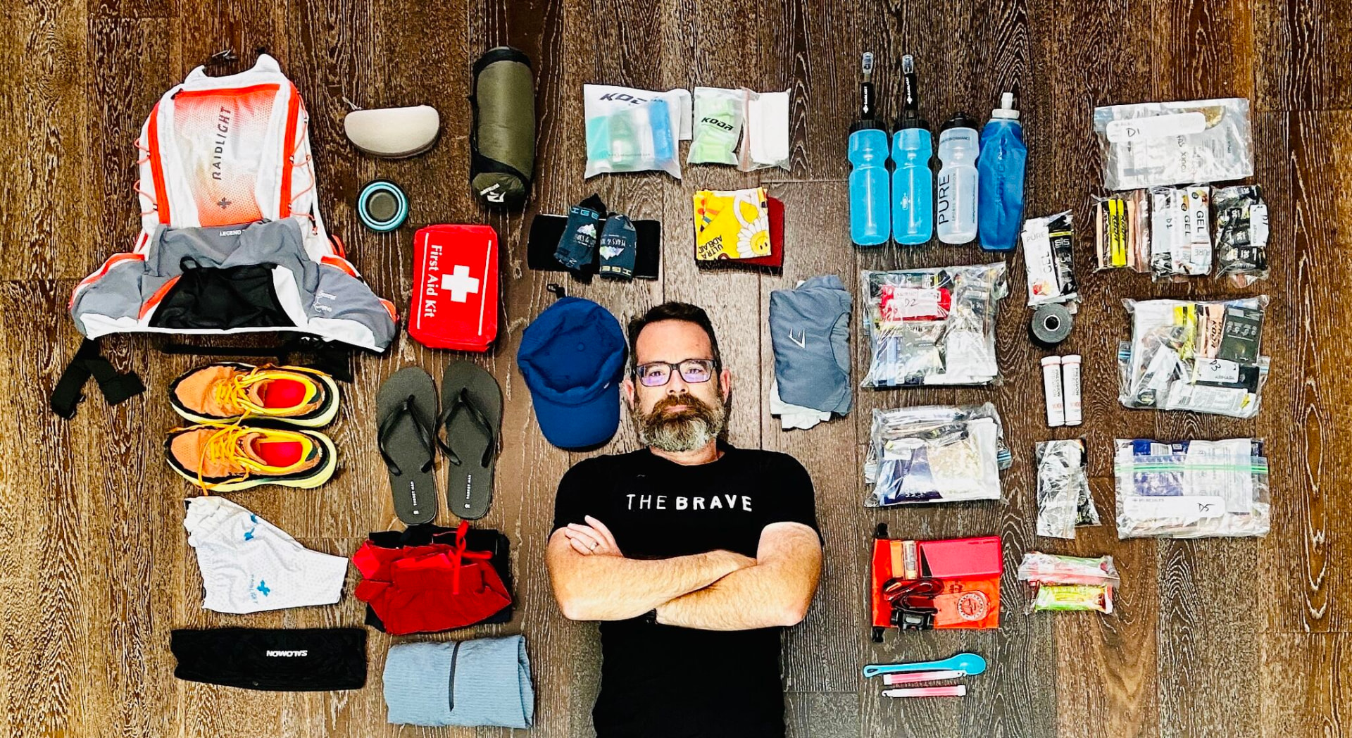 Paul Watkins surrounded by his laid-out race kit