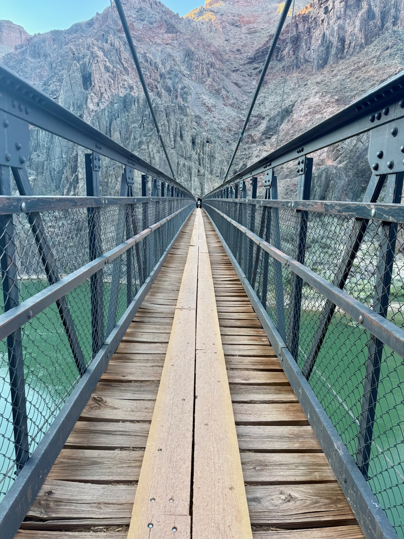 The suspension bridge over the Colorado River far below.